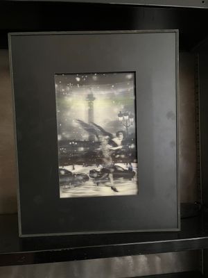 a picture of a picture on a shelf in a room