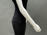 an image of a mannequin wearing a black dress and hat