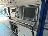 an image of a machine that has a laptop on it