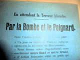 un vieux journal français sur lequel figure la photo d'un homme