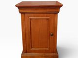 an image of a small wooden cabinet on a white background