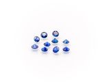 a group of blue sapphires on a white background
