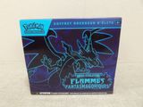 a box of pokemon figurines with a dragon on it