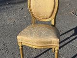 a chair that is sitting in the middle of the road