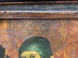 a painting of a man with a green hat on