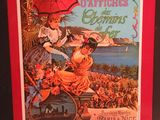 un livre rouge sur lequel figure l'image d'une femme tenant un parapluie
