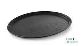 un plateau noir muni d'un couvercle noir posé sur une surface blanche