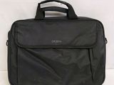 a black bag that is sitting on a white surface