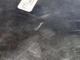 a close up of a metal pan with a label on it