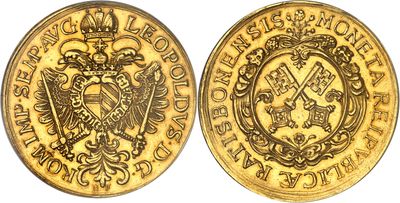 a gold sovereign coin with a crown on the front and a shield on the back