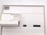 a white box with a charger and a charger attached to it