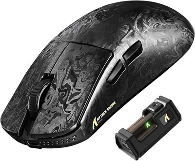 an image of a computer mouse with a battery in front of it