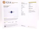 a close up of a brochure with a ring on it