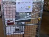 a metal cart with a sign on it in a warehouse