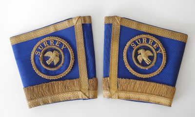 pair of royal blue and gold military shoulderbands with eagle emblem