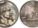 deux médaillons en argent représentant un homme barbu et une femme