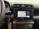 a picture of a car dashboard with a gps device