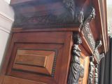 a large wooden chest sitting on a hard wood floor