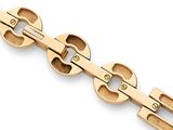 a close up of a gold bracelet on a white background