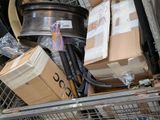 a pile of boxes and other items in the back of a truck