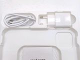 a white tray with a charger and a cable attached to it