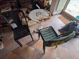 a view of a living room from above of a table and chairs