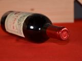 a bottle of wine that is sitting on a table