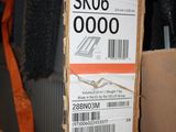 a cardboard box with a label on it that says edw sk06 0000