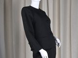 an image of a mannequin dressed in a black dress