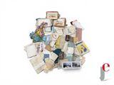 a pile of old books on a white surface