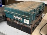 a stack of old suitcases sitting on a table