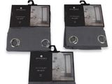 three black and white towels are on display on a white background