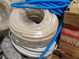 a lot of hoses and other items in a box