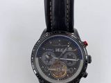 someone is holding a wrist watch with a black leather strap