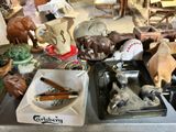 a table with a lot of assorted items on it
