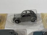 a small toy car sitting on top of a plastic tray