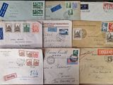 several old envelopes are sitting on top of a wooden table