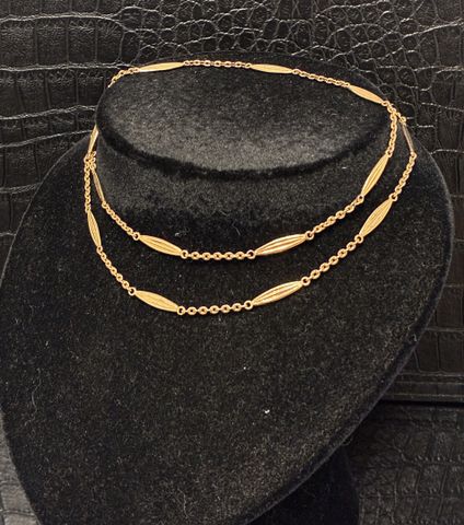 Collier sautoir en or 18 carats 750 millièmes mailles forçat et 1...