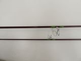 two fishing rods that are attached to the wall
