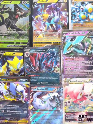 a lot of different pokemon cards on the table