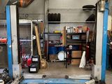 an image of a garage with a lot of tools in it
