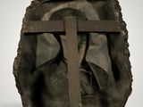an image of a statue of a woman with a cross on her head