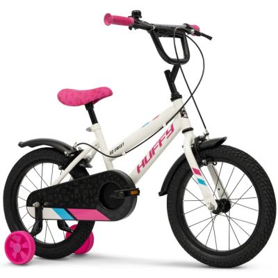 a close up of a child ' s bike with a pink handlebar