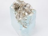 chunk of ice crystals on a white surface with a white background