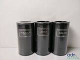 three black canisters with labels on them sitting on a table
