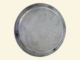 a silver plate with a hole in the middle of it