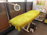 an ironing board sitting on a table in a room