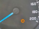 a close up of a speedometer on a car