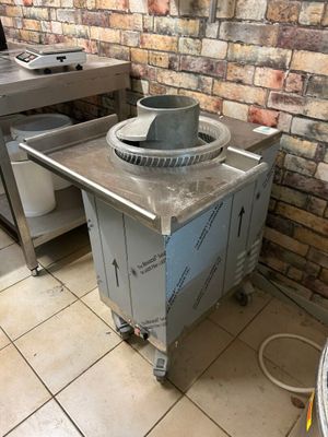 an image of a kitchen with a stove and a sink