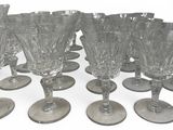 a lot of empty wine glasses sitting on a table